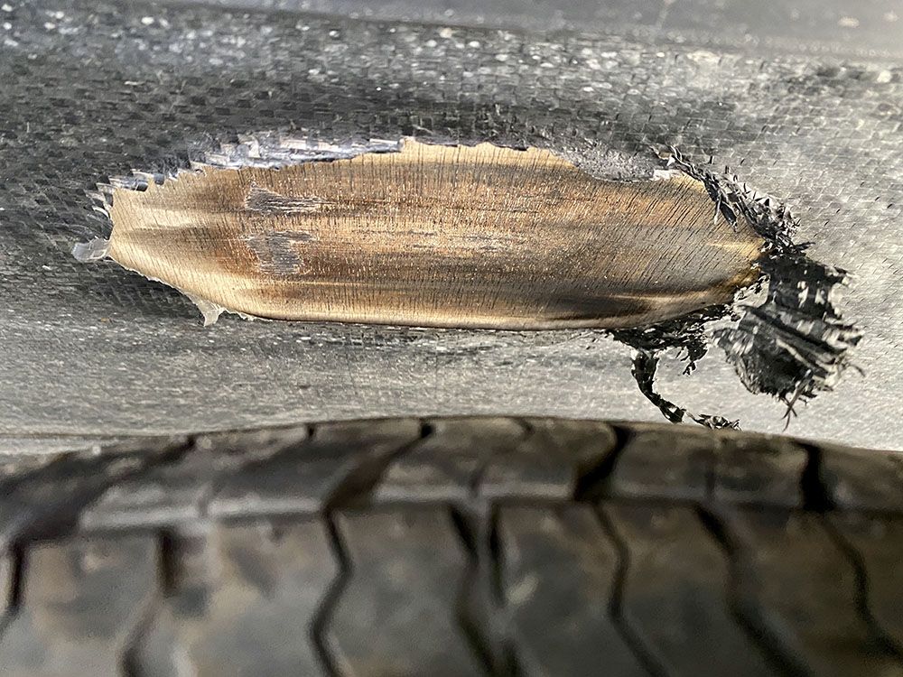tire rubbed underbelly of trailer
